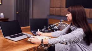 Women writing notes on a notepad